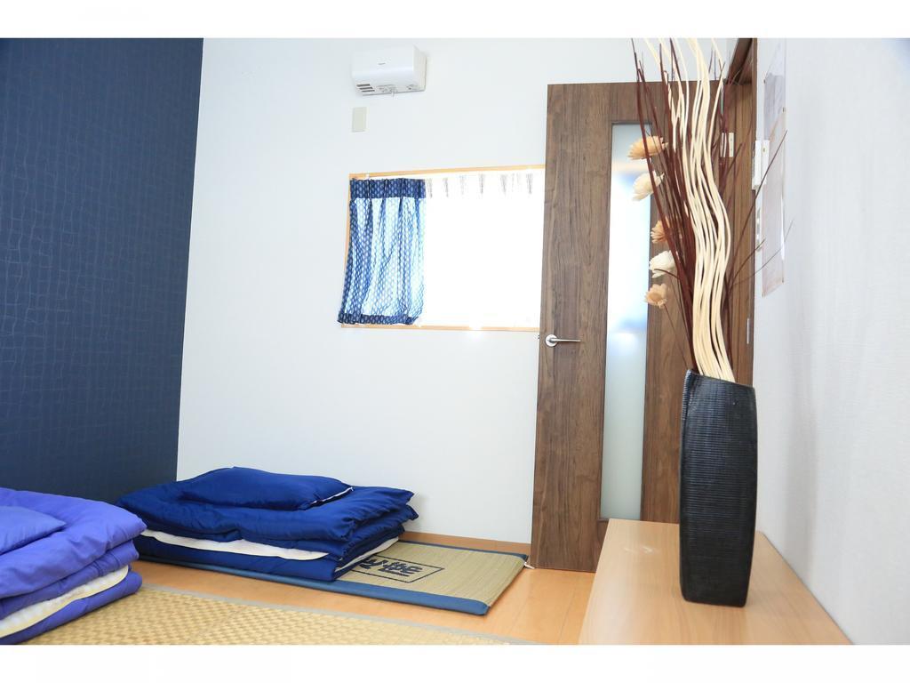 Guest House Arashi Muko Bagian luar foto