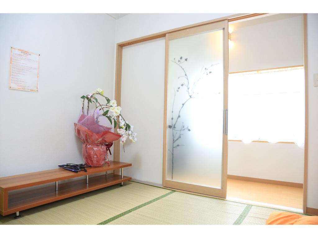 Guest House Arashi Muko Bagian luar foto